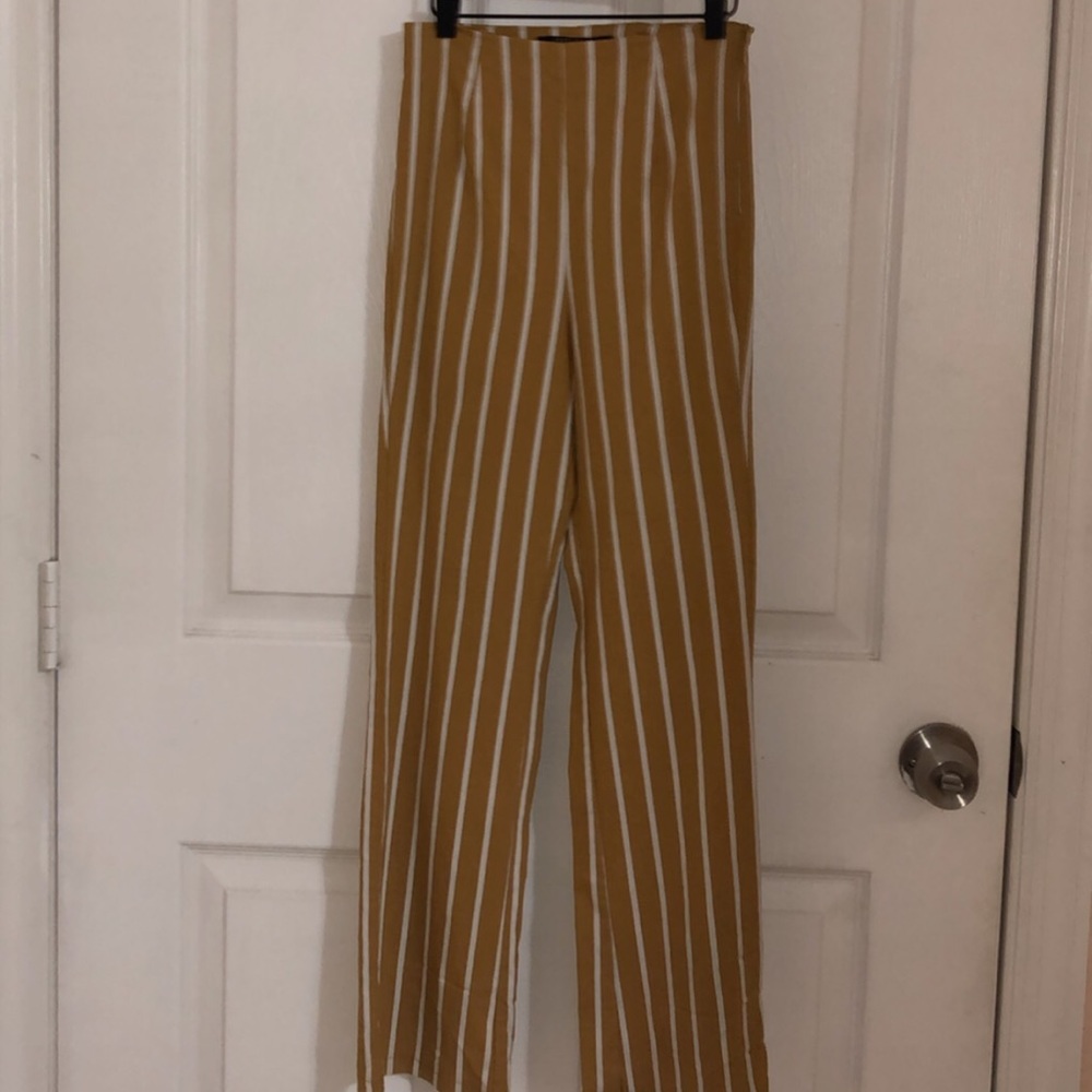 Mustard striped pants.